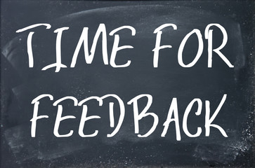 Fototapeta premium time for feedback text write on blackboard