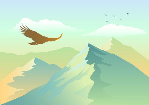 Silhouette of an eagle soaring above mountains