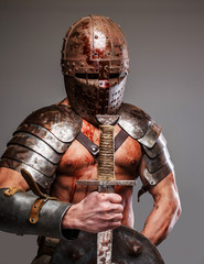 Gladiator holding shield and sword