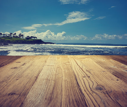 wooden table background on the tropical  beach