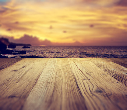Fototapeta wooden table background on the tropical  beach