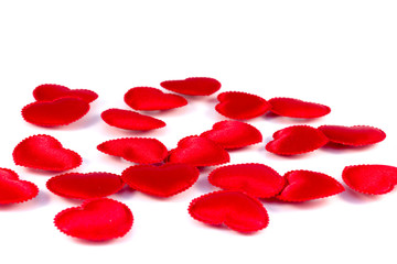 Several small red hearts tissue on a white background