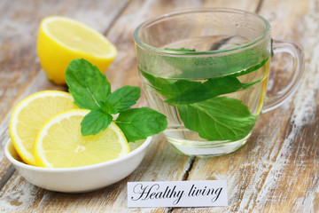 Healthy living card with mint tea and lemon