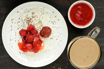 Cottage cheese with fresh berries and coffee with milk for break