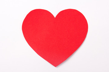 handmade red paper heart over white