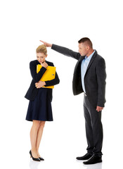 Businessman screaming at a colleague