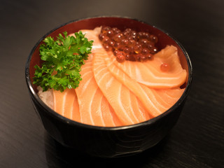 Bowl of Japanese salmon don (sushi rice) topped with salmon roe