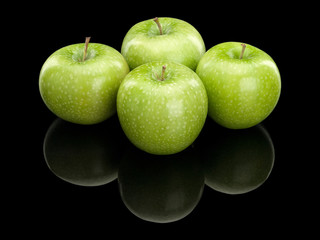 Four green apples