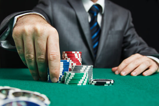 Blackjack In A Casino, A Man Makes A Bet