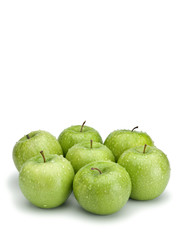 Seven green apples