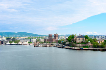 Fototapeta na wymiar View of Oslo, Norway Radhuset and Akershus castle from the sea