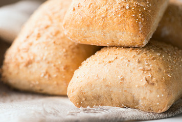 Oven baked bread on table close up