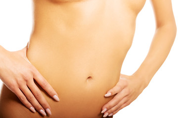 Close up on a perfect slim woman belly