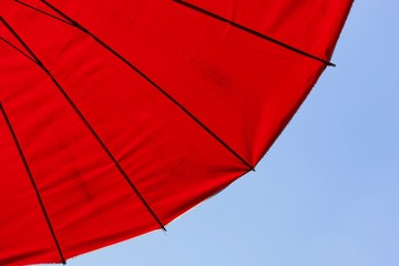 red umbrella in the sky.