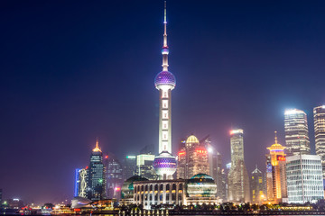 Pudong landmarks at night in Shanghai, China
