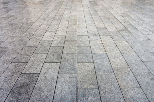 Wet ceramic tiles pavement