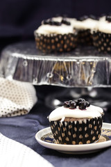 Muffins from semolina with blueberry jam and cream
