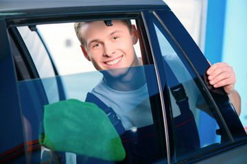 Naklejka premium Car mechanic at the service station