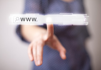 Young businesswoman touching web browser address bar with www si - obrazy, fototapety, plakaty