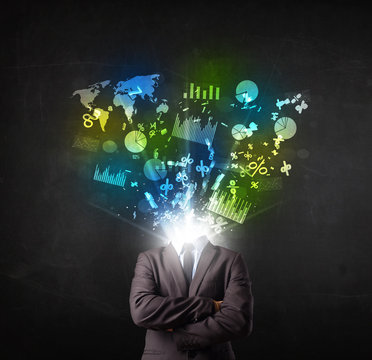 Business man in suit with graph and charts exploding from his bo