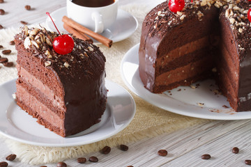 chocolate cake with cherry and a piece. Horizontal