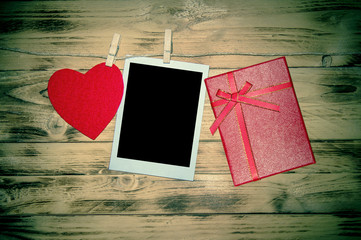Valentines background with red heart and gift.