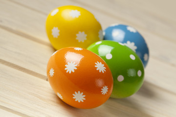 Easter eggs on wooden boards