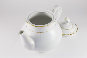 Porcelain teapot with gold border