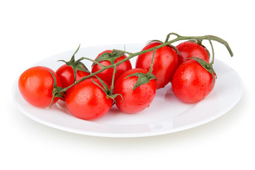 cherry tomatoes with dew on a plate