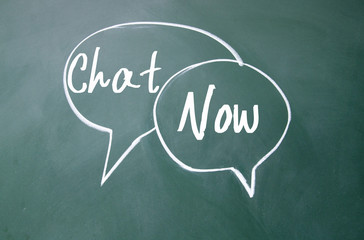 chat now symbol sign on blackboard