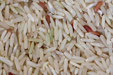coarse rice or half polished rice background, uncooked raw cerea