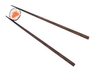 Maki sushi with salmon in chopsticks