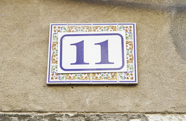 Number eleven a wall of a house