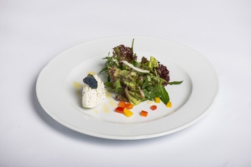 Fresh salad and ricotta with bue caviar