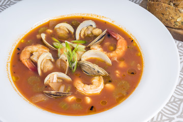 Spicy Seafood Soup Served with Bread