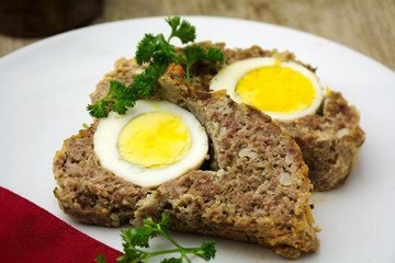 easter meal, meatloaf bread with boiled eggs inside