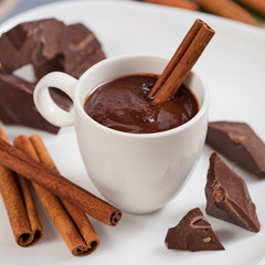 Hot chocolate, chocolate chips, cinnamon and star anise