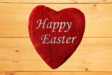 Rotes Herz frohe Ostern mit Holz Hintergrund