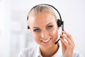 Close-up portrait of a customer service agent sitting at office