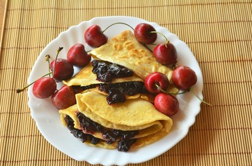 Homemade Pancakes With Jam And Fresh Cherries