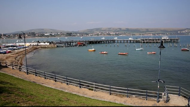 Swanage harbour boats and jetty Dorset England UK