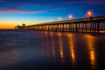 Fototapeta na wymiar The fishing pier seen after sunset, in Imperial Beach, Californi