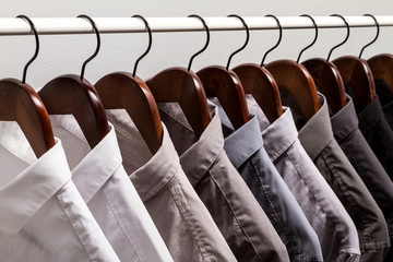 Several shirts on a hanger.