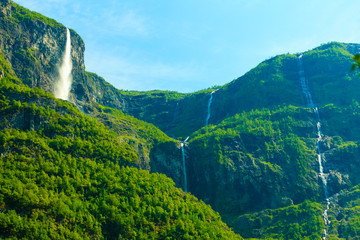 Fototapeta premium Beautiful waterfall in Norway fjords