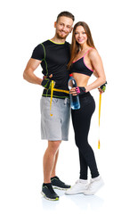 Man and woman with measuring tape on the white background