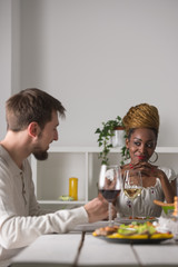 Obraz na płótnie Canvas Multiracial Couple Enjoying Meal