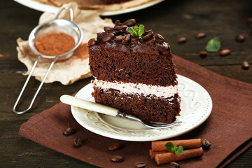 Delicious chocolate cake on table close-up