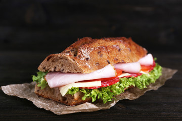 Fresh and tasty sandwich with ham and vegetables