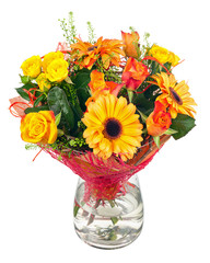 Bouquet of gerbera, roses and other flowers in glass vase.