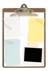 Clipboard with blank polaroid style instant print photo picture and yellow sticky post it note